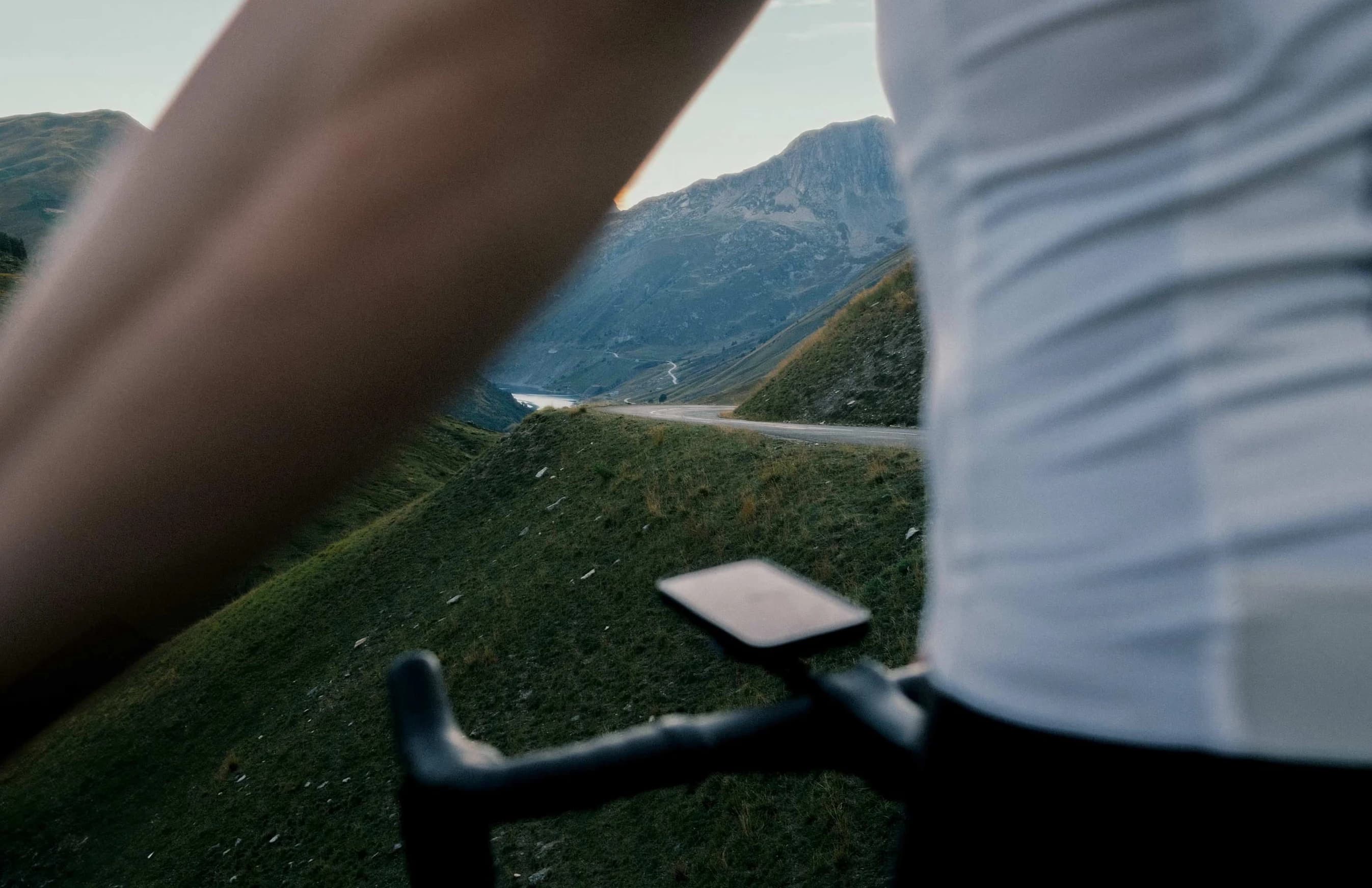 Handlebar view of cycling on mountain road