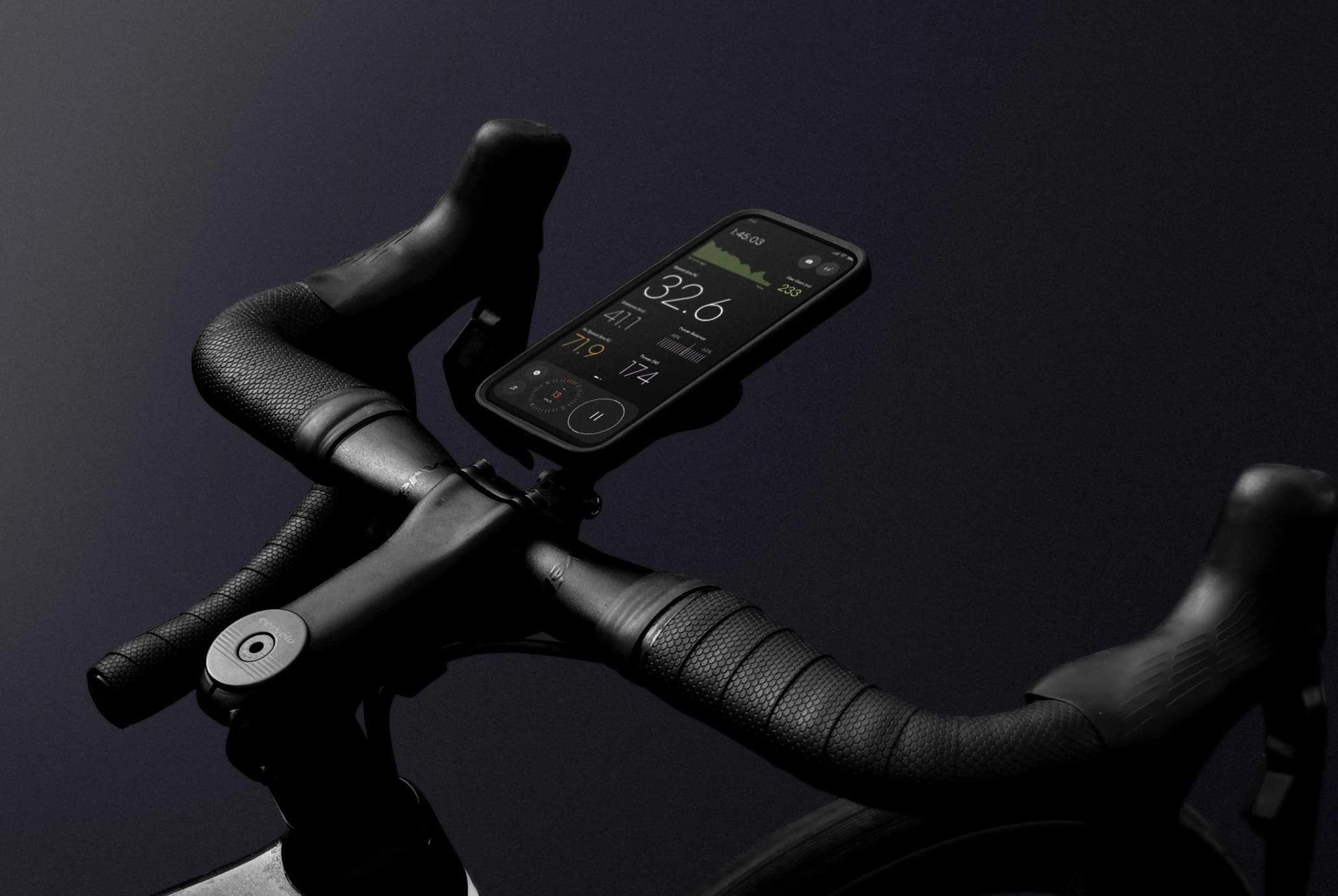 Bicycle handlebars with iPhone showing Ride app